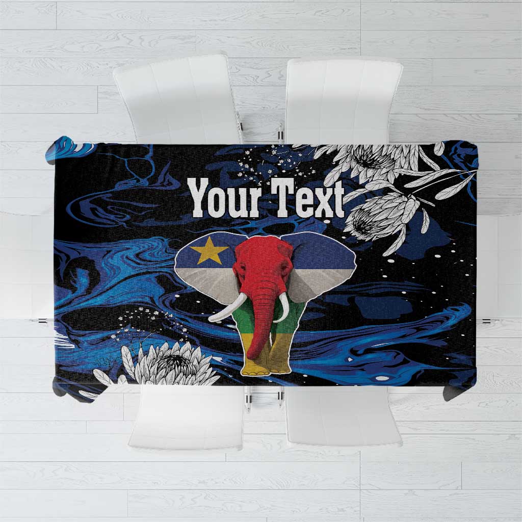 Black tablecloth with blue abstract waves and central elephant graphic