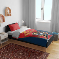 Red and navy duvet on bed with lion mascot holding ball, 'YOUR TEXT' and '00'
