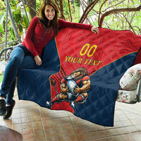 Rugby quilt blanket draped on outdoor seating, red and navy with lion and “YOUR TEXT”