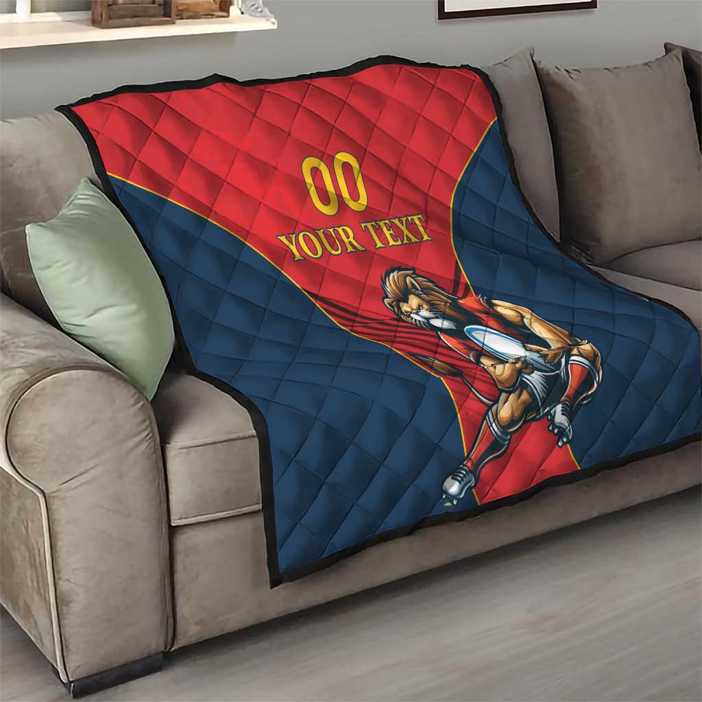 Rugby quilt blanket over a sofa, red section with “00 YOUR TEXT” and lion mascot