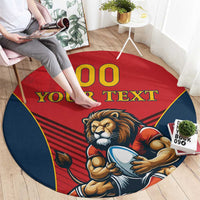 Red round rug with lion mascot holding shield, “00 YOUR TEXT”, blue border