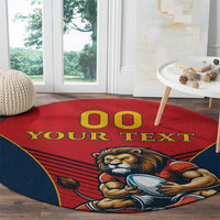 Red round rug with lion mascot, “00 YOUR TEXT” arc, blue border and edging