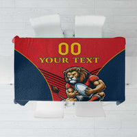 Red and navy rugby tablecloth with gold lettering and lion mascot design
