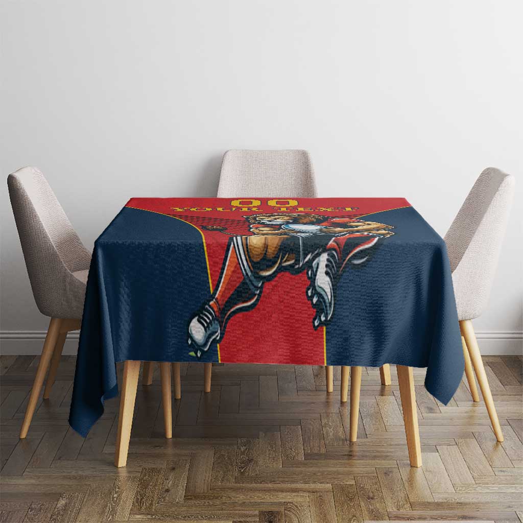 Red and navy tablecloth with lion graphic panels for dining table