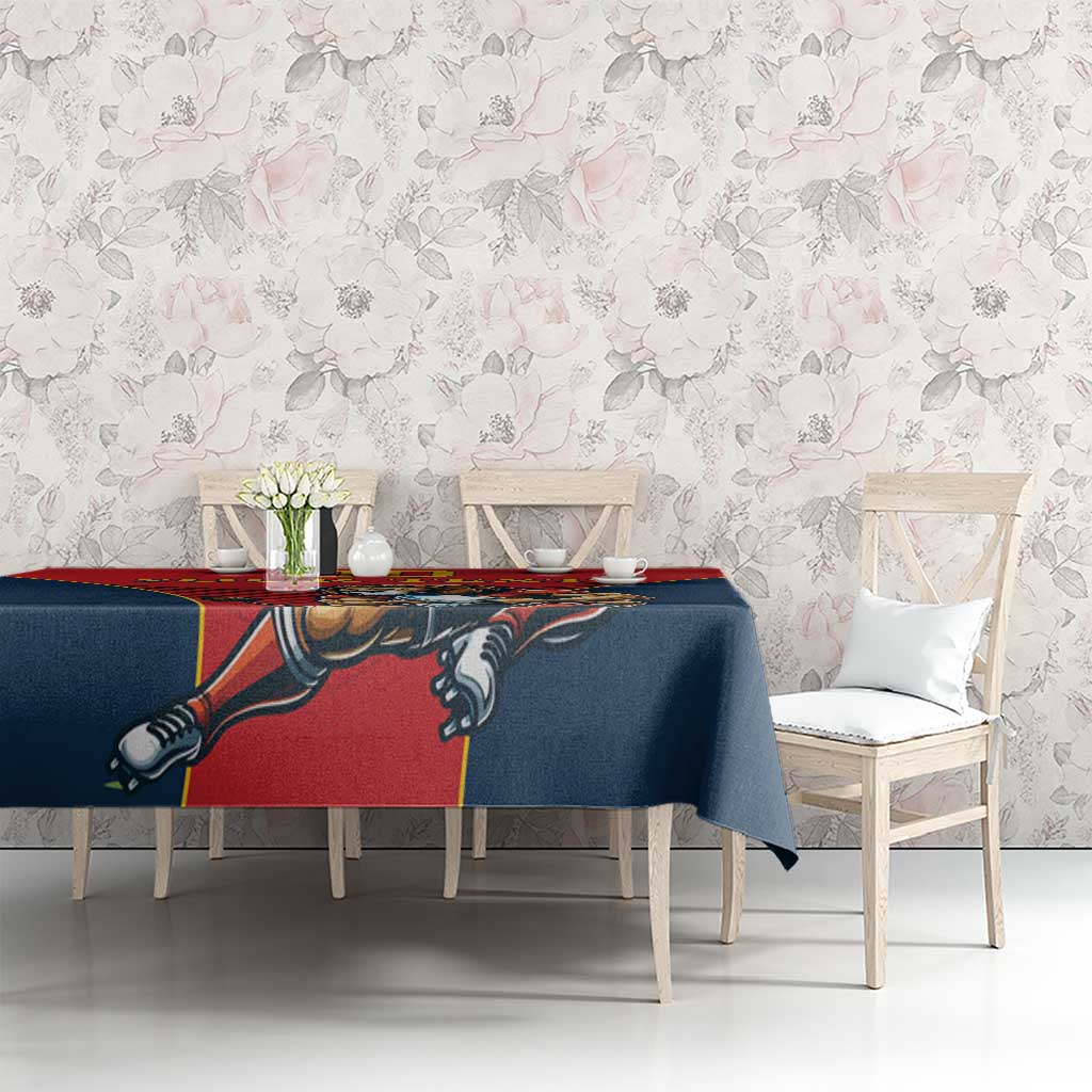 Navy tablecloth with red side panel and lion graphic for dining table