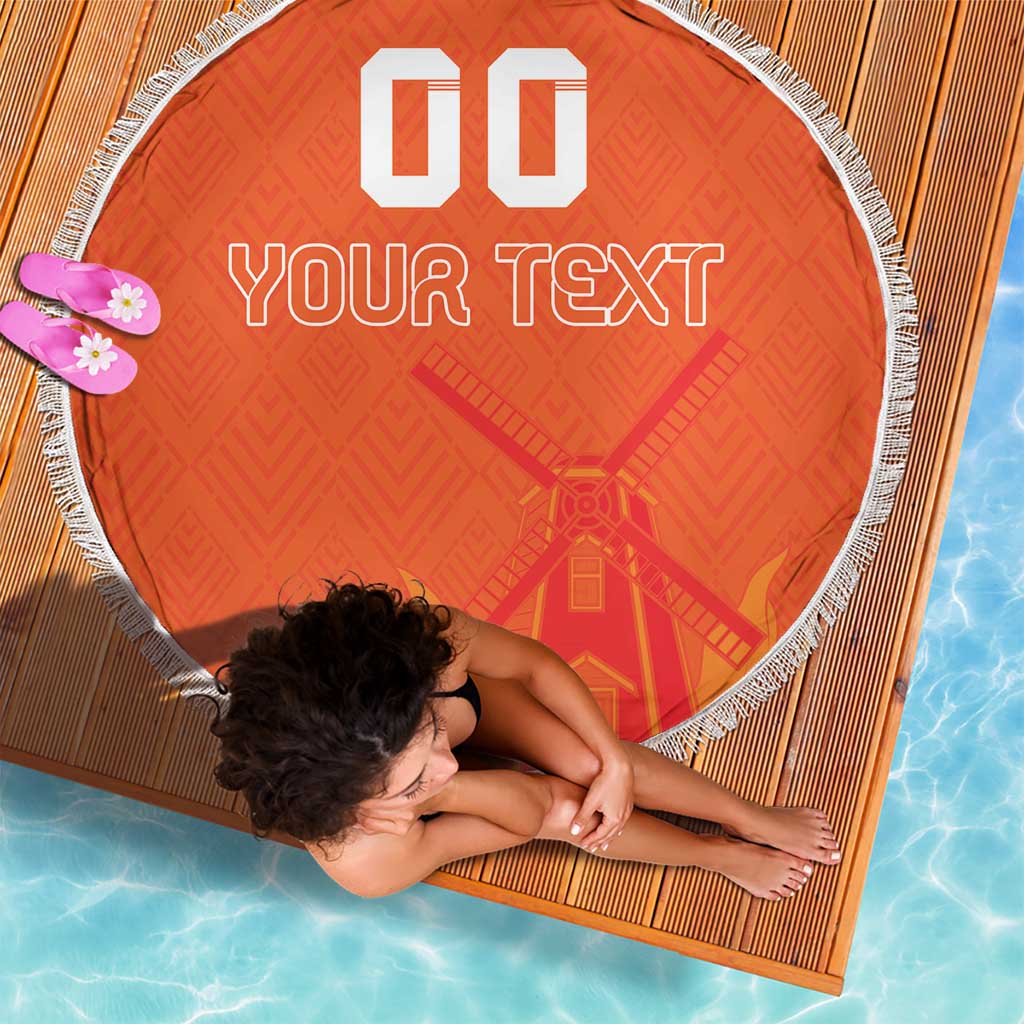 Orange round beach blanket with white fringe, custom text, round woven edge close-up