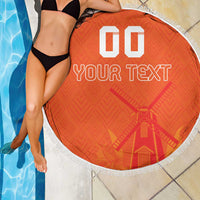 Orange round beach blanket with white fringe, custom text print