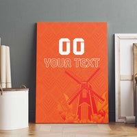 Orange canvas wall art with windmill and tulip graphic, custom text, centered view