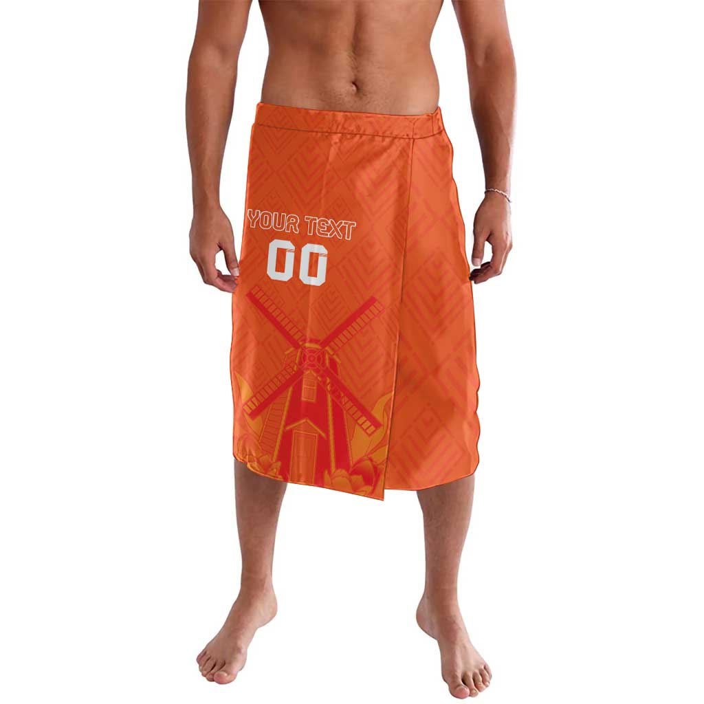 Orange patterned drawstring shorts with elastic waistband and jersey-style graphic