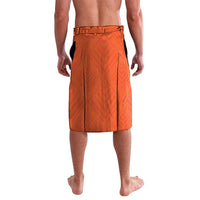 Orange patterned drawstring shorts with adjustable waistband and knee-length cut