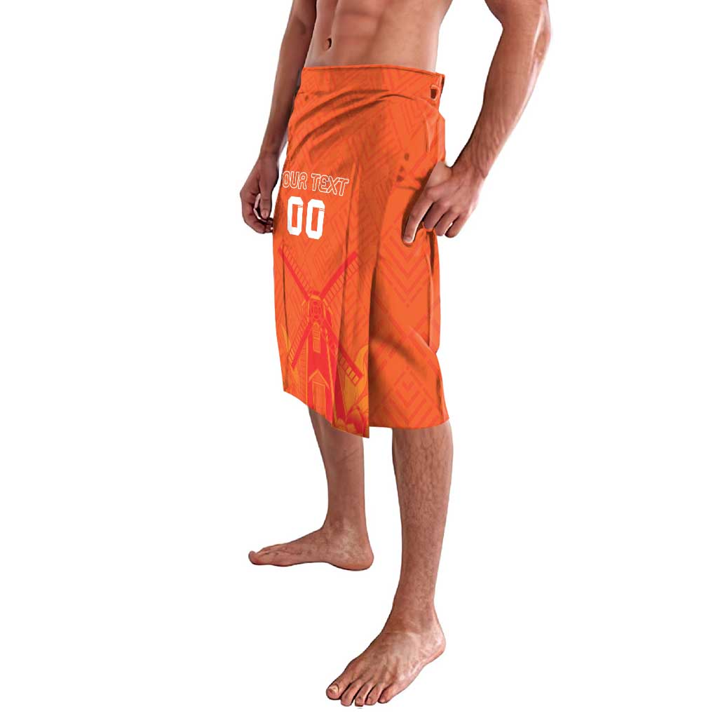 Orange patterned drawstring shorts with side slit detail and visible pocket