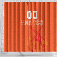 Orange shower curtain with windmill and tulip jersey pattern, “GO” and “YOUR TEXT” design