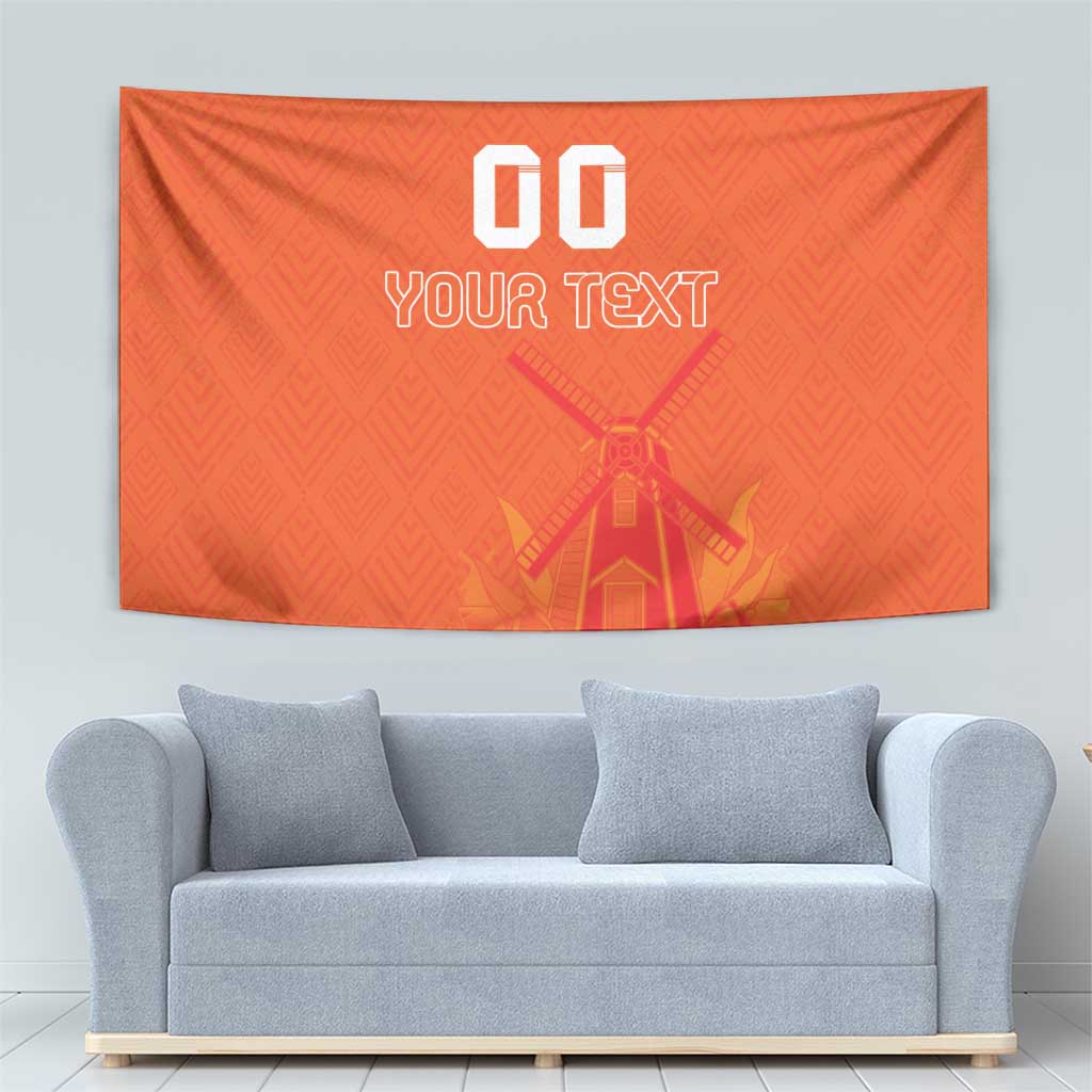 Orange wall tapestry with "00 YOUR TEXT" and windmill/tulip artwork across center.