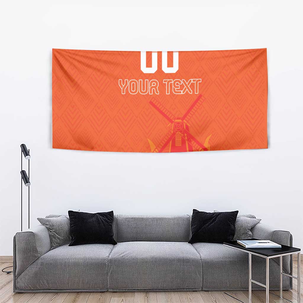 Orange wall tapestry displaying "00 YOUR TEXT" and a windmill with tulip details.