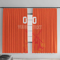 Orange curtain panels with centered 'YOUR TEXT' and jersey-style emblem