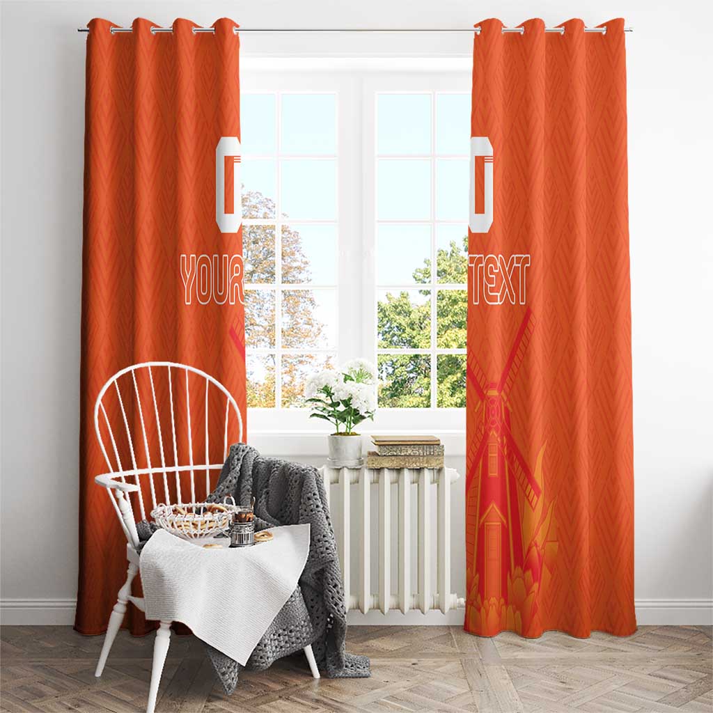 Orange hanging curtain panels with 'YOUR TEXT' and jersey-style crest