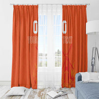 Orange window curtain panels with 'YOUR TEXT' jersey-style artwork