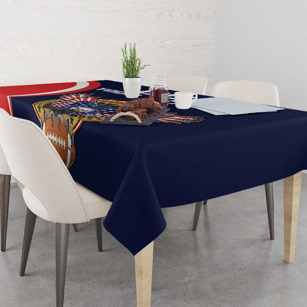 Navy tablecloth with rugby ball emblem and USA-themed wings, draped over dining table