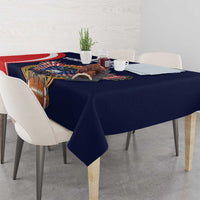 Navy tablecloth with rugby ball emblem and USA-themed wings, draped over dining table