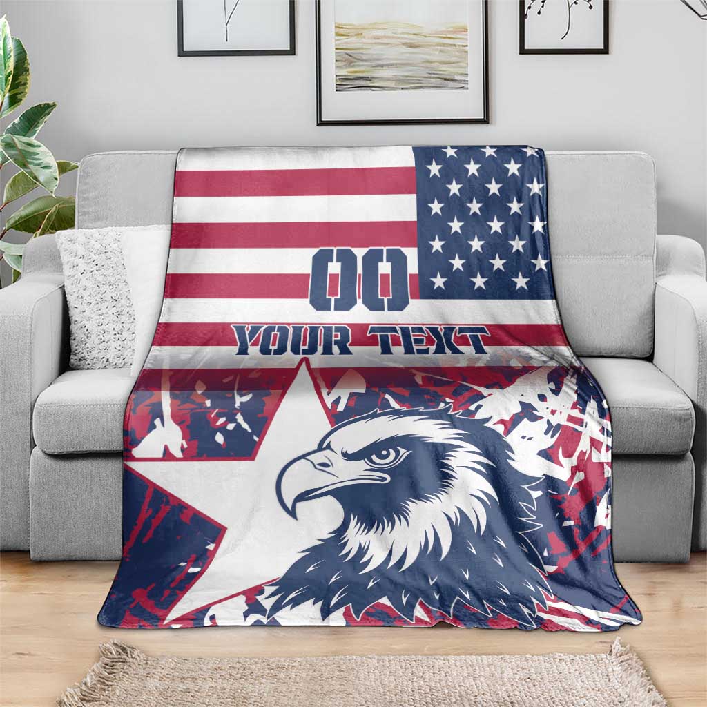USA rugby blanket on gray sofa with red-white stripes, blue stars corner, bald eagle graphic