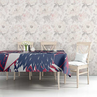 Red, white and blue eagle-themed tablecloth on dining table with chairs