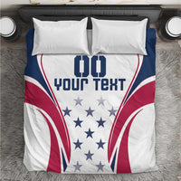 White duvet cover with two pillow shams, navy/red rugby flag graphic and star pattern