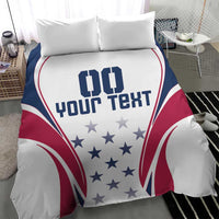 White duvet cover and two pillow shams featuring navy and red rugby flag curves and stars