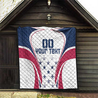 Quilt hanging inside a shed doorway, navy top with white-red heart graphic and stars