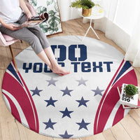 Round white area rug with navy and red star-and-stripe design and bold custom text
