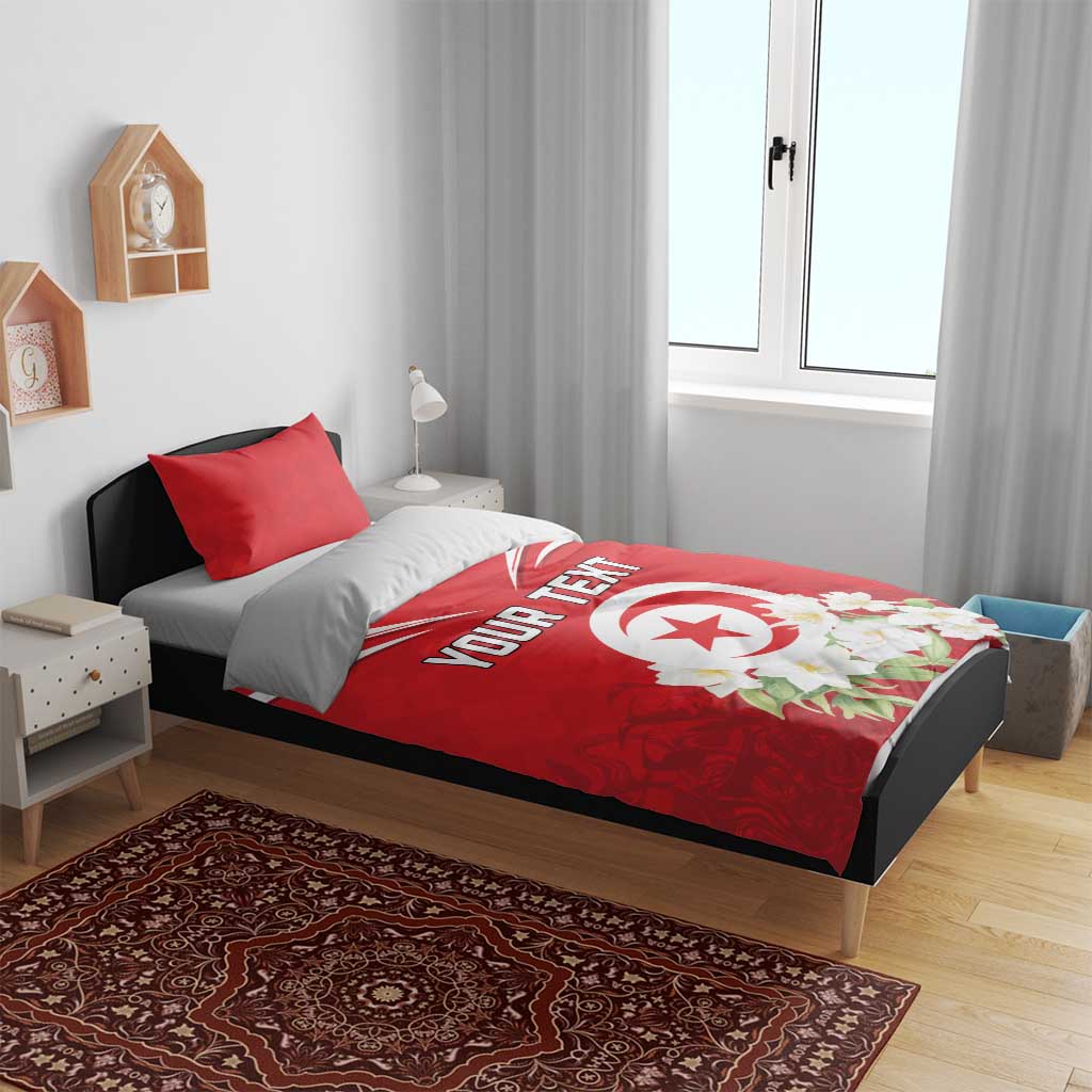Red duvet and pillow set with “YOUR TEXT” and white emblem with flower details