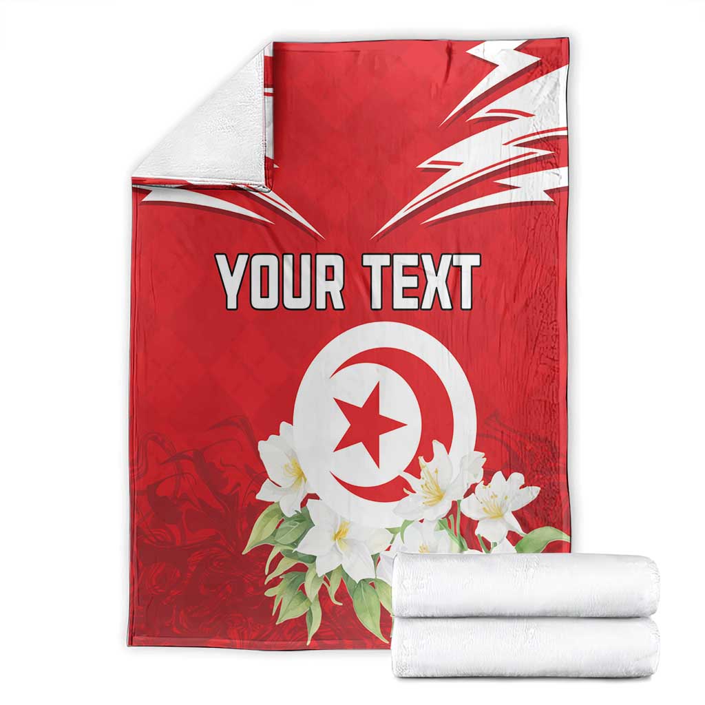 Red Tunisia blanket with white emblem and jasmine flowers, custom text, folded