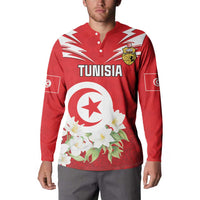 Red Tunisia button sweatshirt on model with crest, star emblem, and flower graphic