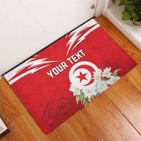 Personalized red rubber doormat with white crest circle, flowers, and custom text layout