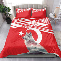 Personalized bedding set in red with white geometric accents, wolf print, and “YOUR TEXT”