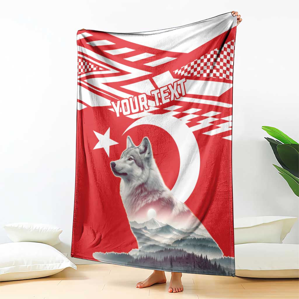 Red personalized wolf and Turkey flag style blanket, hanging on floor edge