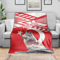 Red personalized wolf and Turkey flag style throw blanket on gray sofa
