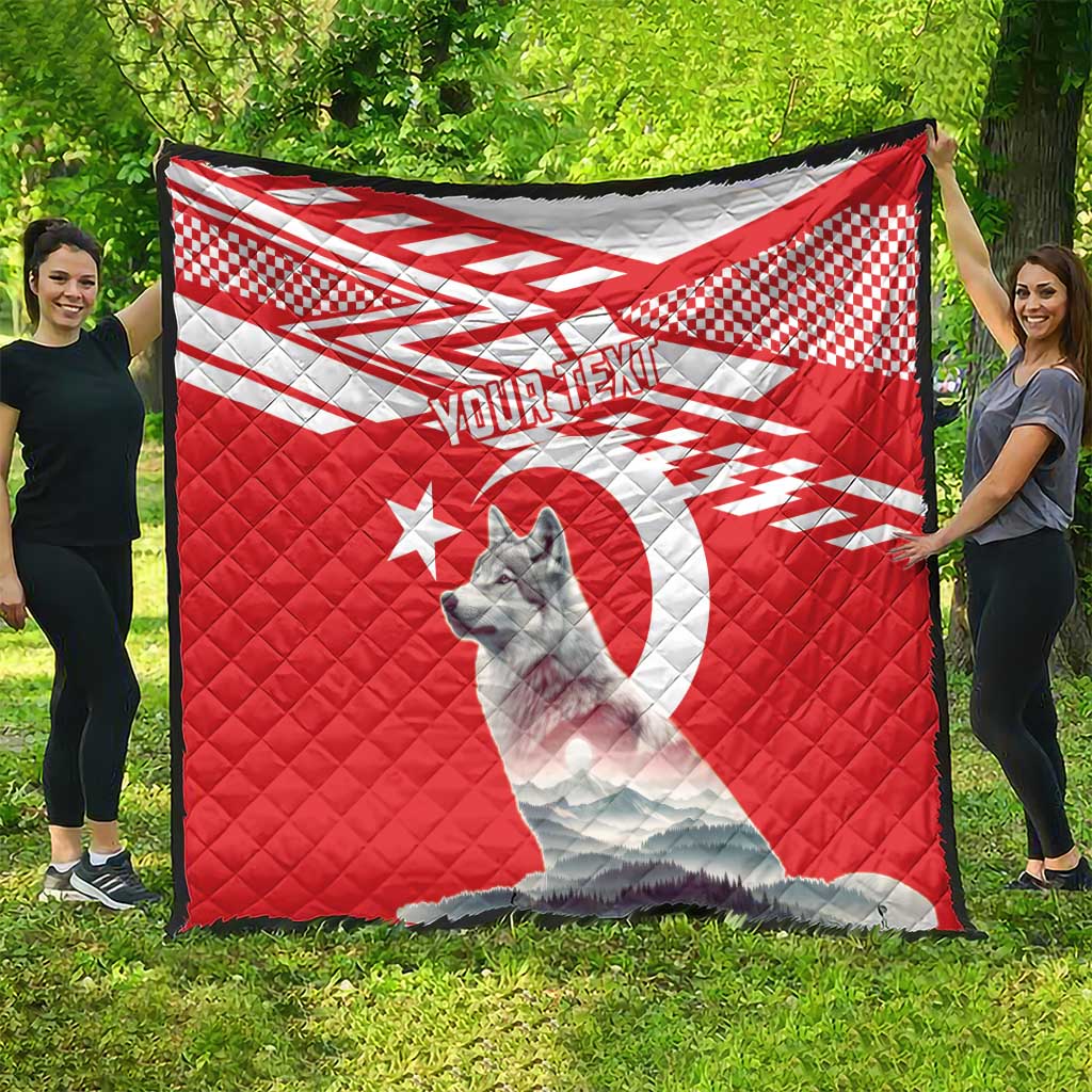 Red and white outdoor quilt featuring a gray wolf, star and circle design with custom text