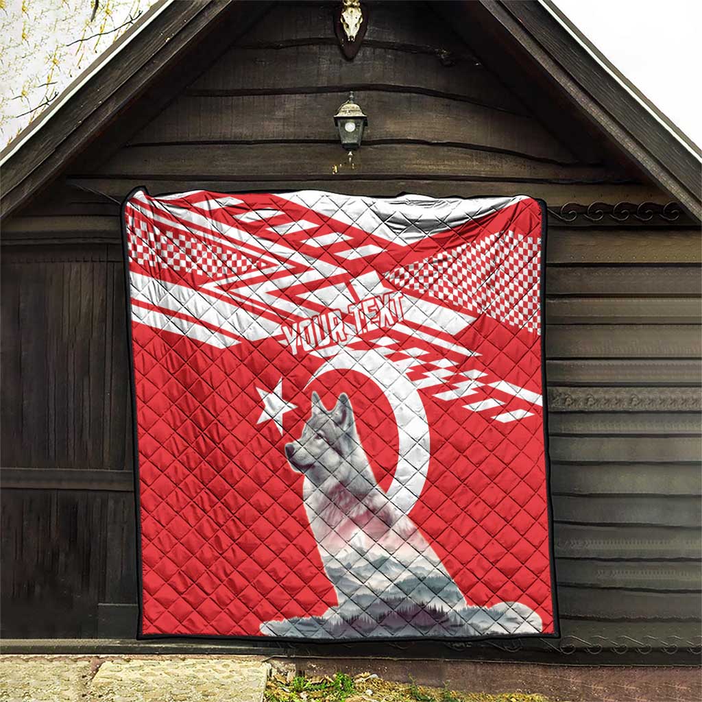 Red and white quilt with gray wolf and star circle design, checkered stripe pattern