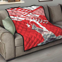 Red and white quilt with gray wolf artwork and star, quilted squares texture