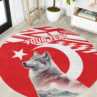 Round red rug with gray wolf and white crescent star graphic, custom text center.