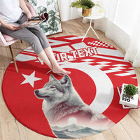 Round red rug with gray wolf portrait, white crescent and star graphics, custom text.