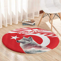 Round red wolf rug with gray wolf image, white crescent and star pattern, custom text.