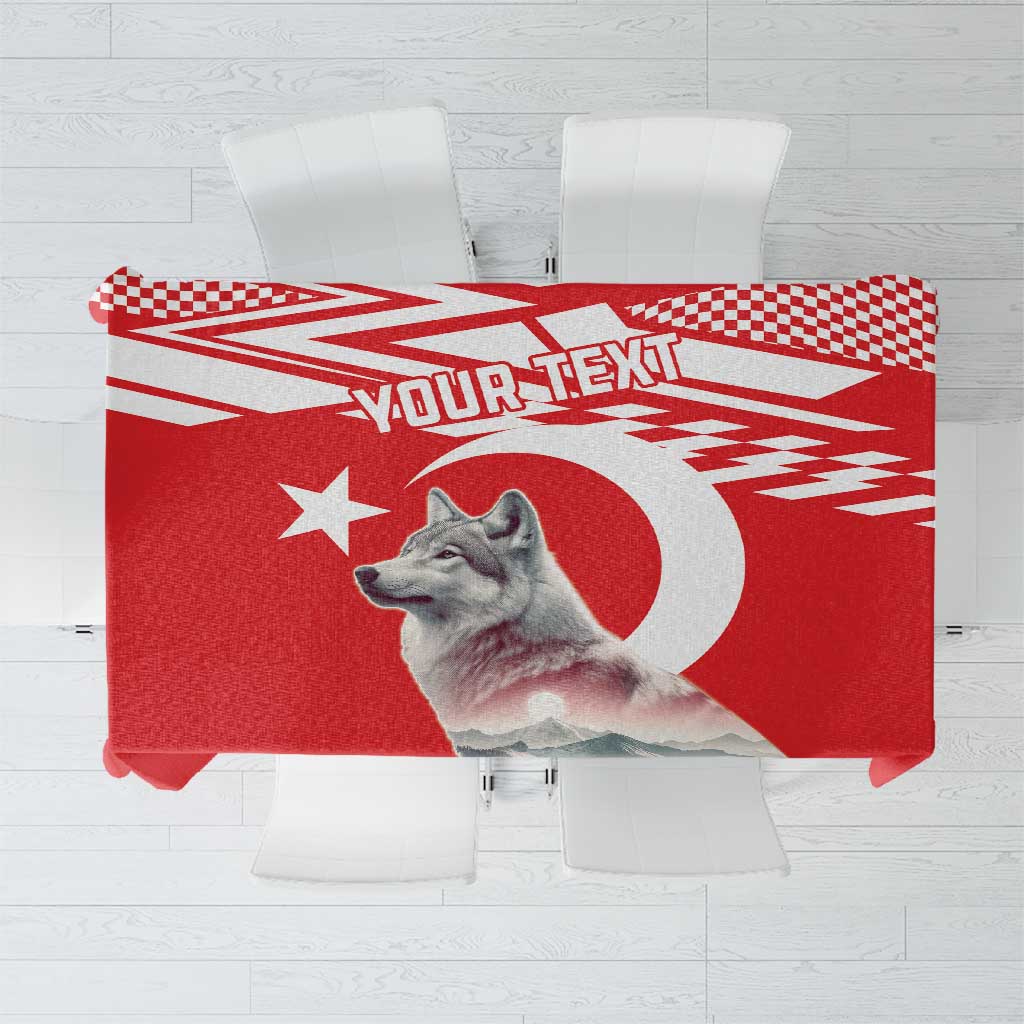 Personalized red tablecloth with check trim, wolf graphic, and “your text” area