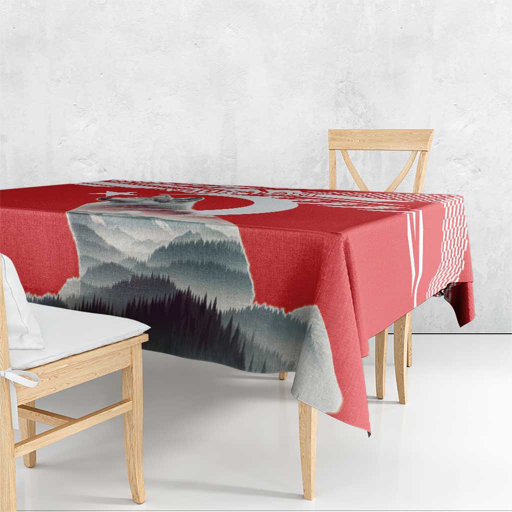 Red personalized tablecloth with mountain print and check pattern edging