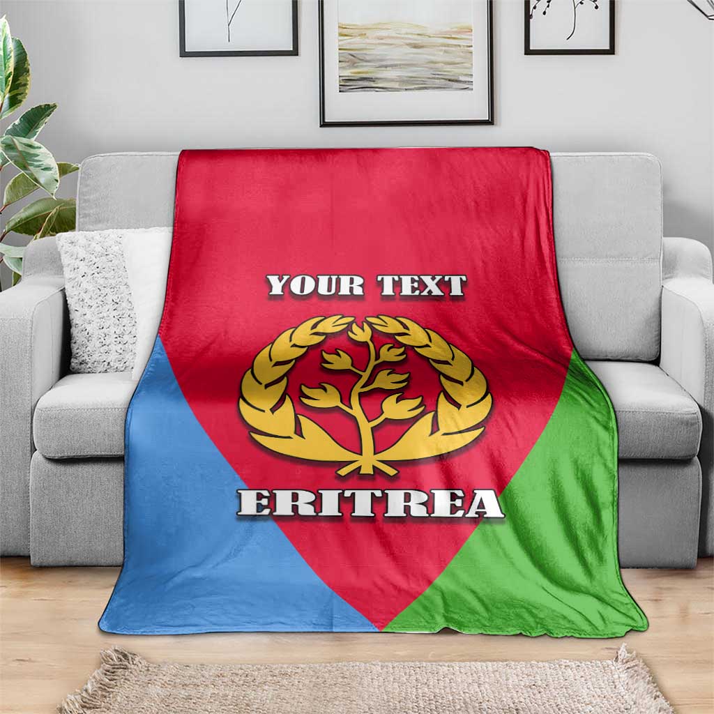 Personalized Eritrea emblem blanket on gray sofa with “YOUR TEXT” and “ERITREA”