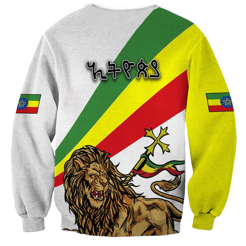 Unisex white sweatshirt with printed script, Ethiopian flag stripes, and lion back graphic