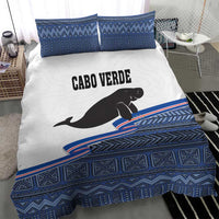 Cabo Verde manatee bedding set with blue geometric border and two matching square shams