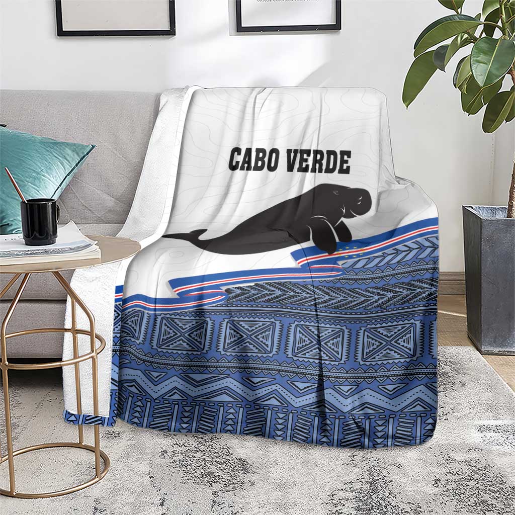 Cape Verde manatee blanket, white with black manatee, blue geometric bands, CABO VERDE