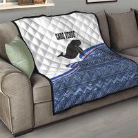 Cape Verde manatee quilt on sofa, white diamond quilting with blue patterned lower section
