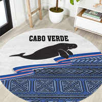 Round area rug with manatee silhouette, Cabo Verde text, blue patterned border and stripe